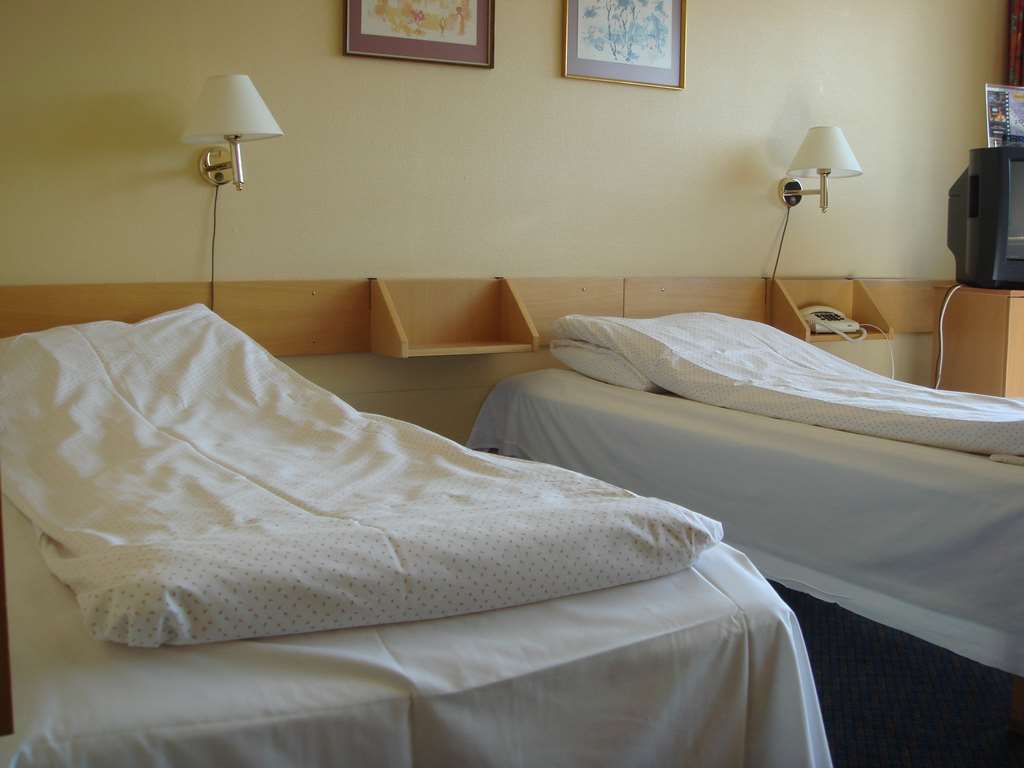Dombas Hotel Cameră foto